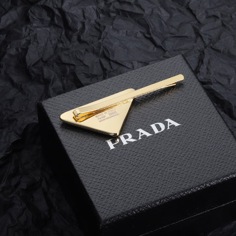 PRADA トライアングルロゴゴールドヘアクリップ SS